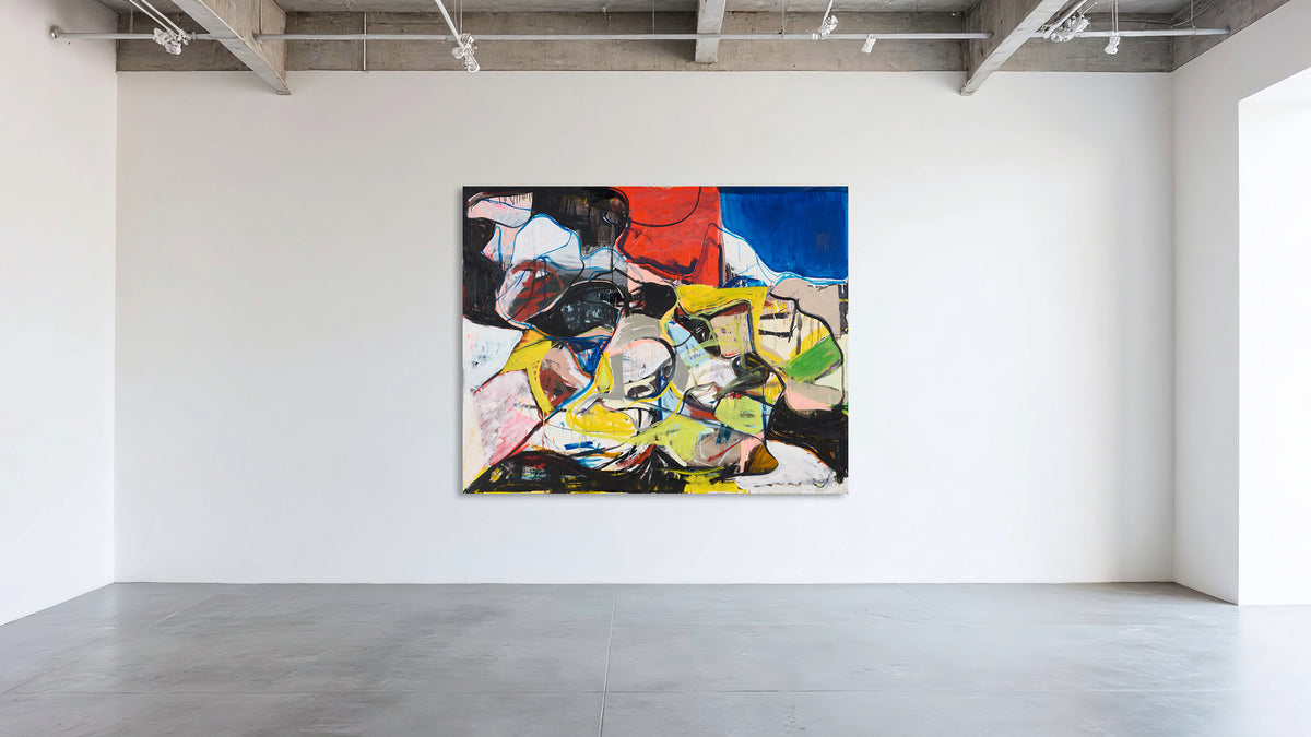 An abstract canvas painting by Ethan Newman with a vibrant mix of red, blue, yellow, green, black, and white brushstrokes, displayed on a clean white gallery wall above a polished concrete floor.